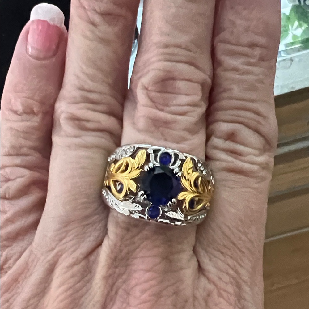 Elegant Gold and Silver Ring with Blue Stone